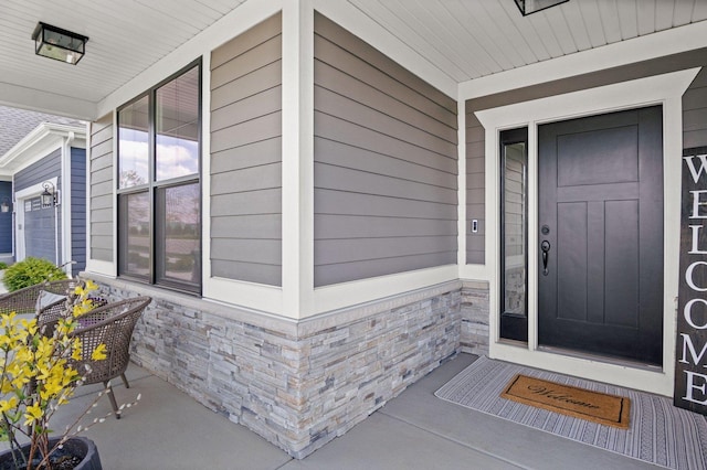 1553 Dempsey Dr, Saint Charles, IL 60174 - property entrance featuring covered porch and stone siding