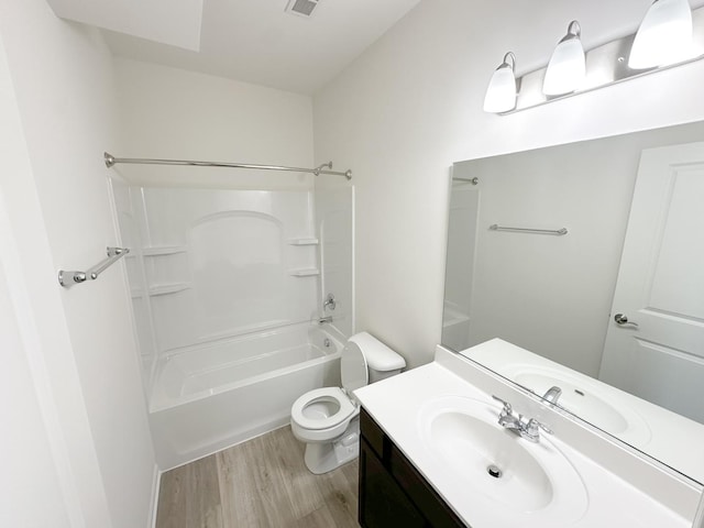 995 Celebration Dr, Aurora, IL 60504 - bathroom with wood finished floors, toilet, vanity, and shower / washtub combination