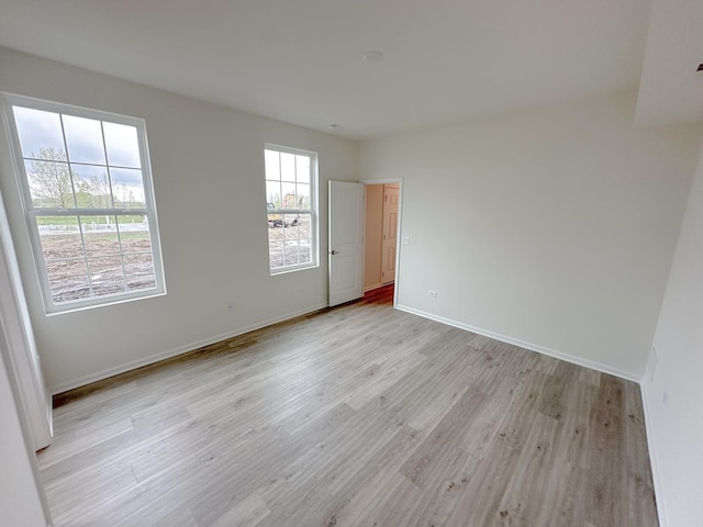 995 Celebration Dr, Aurora, IL 60504 - empty room with light wood-style flooring and baseboards