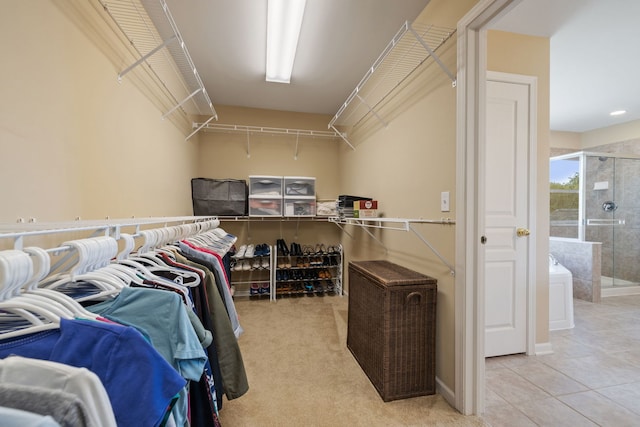 spacious closet with tile patterned flooring