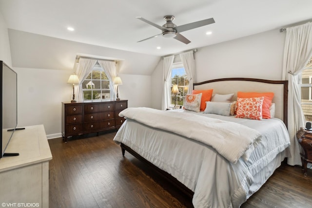 bedroom featuring lofted ceiling, wood finished floors, baseboards, a ceiling fan, and recessed lighting
