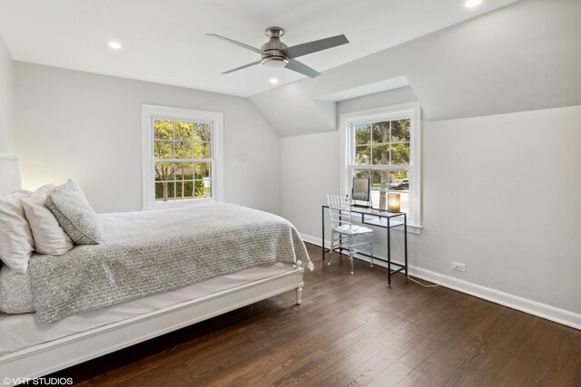bedroom featuring wood finished floors, vaulted ceiling, multiple windows, baseboards, and recessed lighting