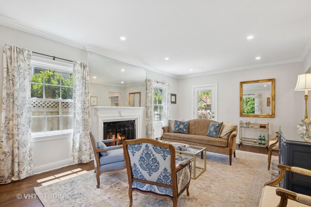 843 Chilton Ln, Wilmette, IL 60091 - living room featuring ornamental molding, a lit fireplace, wood finished floors, recessed lighting, and baseboards