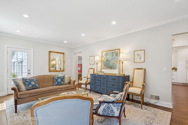 843 Chilton Ln, Wilmette, IL 60091 - living area featuring a warm lit fireplace, baseboards, wood finished floors, recessed lighting, and crown molding