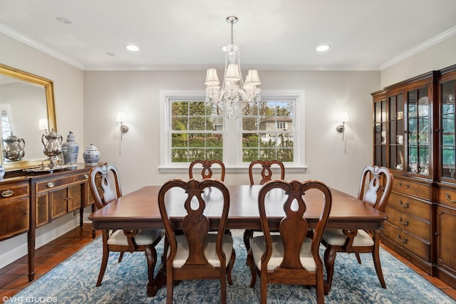 dining area featuring a chandelier, crown molding, and recessed lighting