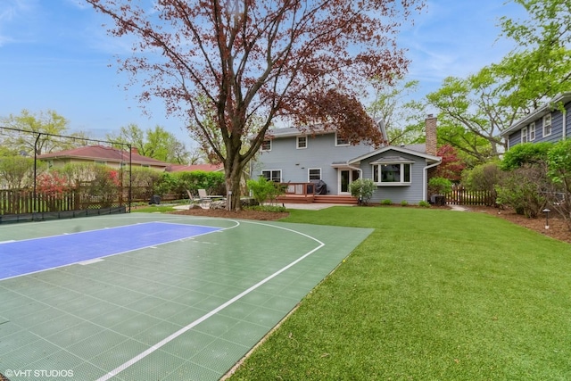 view of basketball court featuring basketball hoop