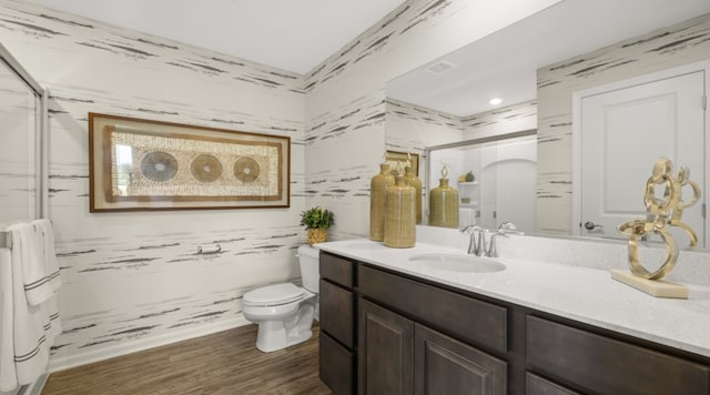 14739 Hillside Dr S, Lockport, IL 60441 - bathroom with a stall shower, vanity, toilet, and wood finished floors