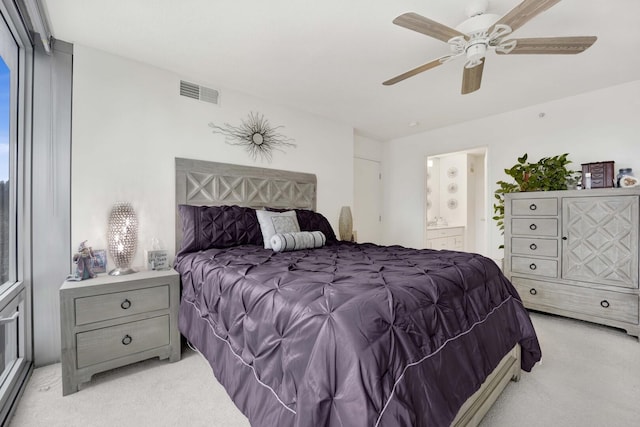 9725 Woods Dr Unit 507, Skokie, IL 60077 - bedroom featuring light colored carpet, connected bathroom, and ceiling fan