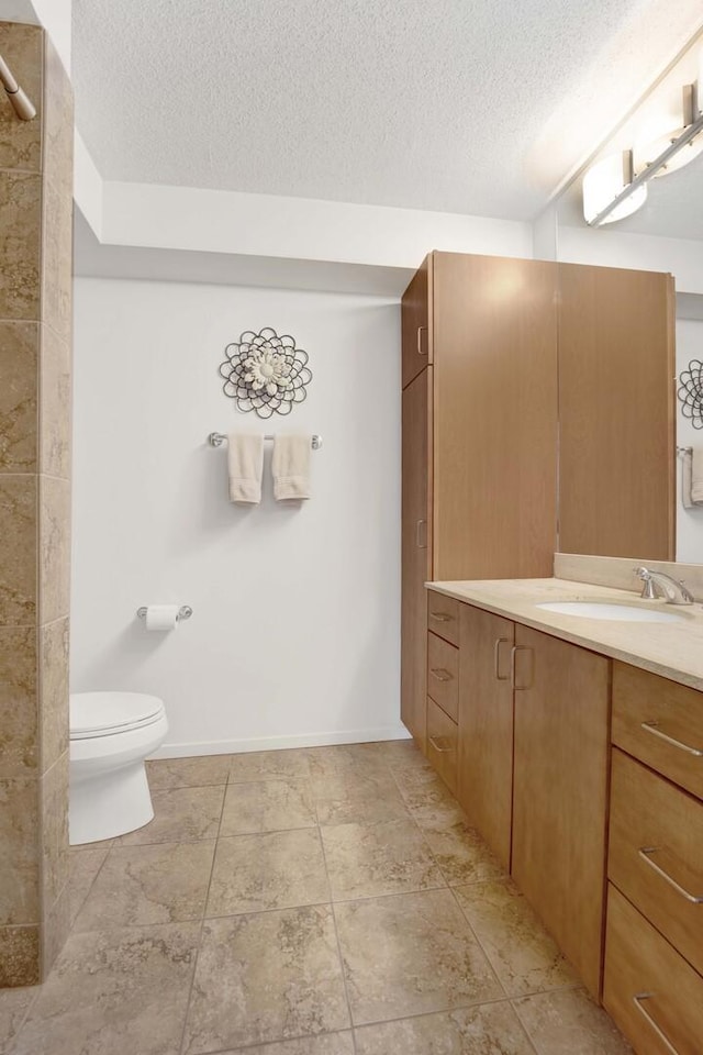 9725 Woods Dr Unit 507, Skokie, IL 60077 - full bathroom featuring a textured ceiling, toilet, and vanity