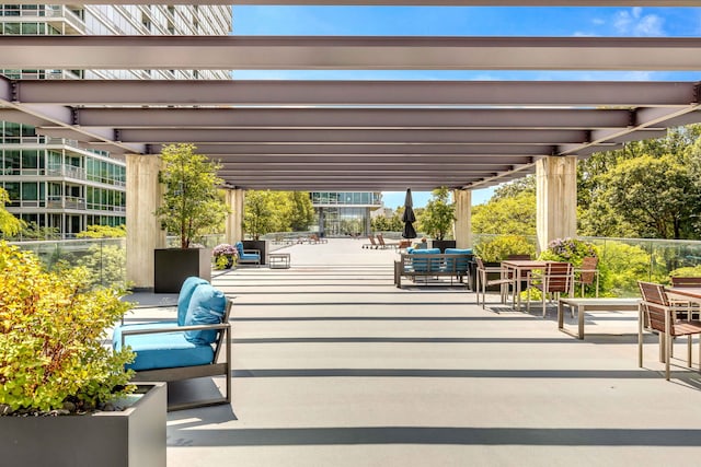 9725 Woods Dr Unit 507, Skokie, IL 60077 - view of patio with a pergola, fence, and an outdoor living space