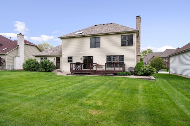 4123 Easy Cir, Naperville, IL 60564 - back of property with a deck, a yard, a chimney, and central AC