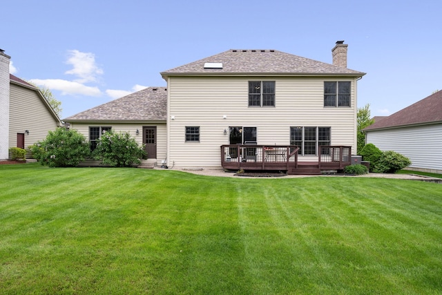 4123 Easy Cir, Naperville, IL 60564 - rear view of property featuring a deck, a lawn, a chimney, and a shingled roof