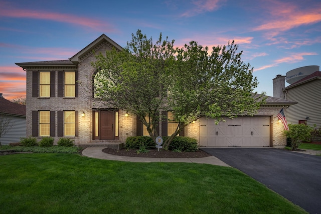 4123 Easy Cir, Naperville, IL 60564 - view of front of house with driveway, brick siding, an attached garage, and a front lawn