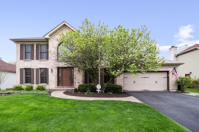 4123 Easy Cir, Naperville, IL 60564 - view of front of house featuring brick siding, asphalt driveway, an attached garage, and a front yard