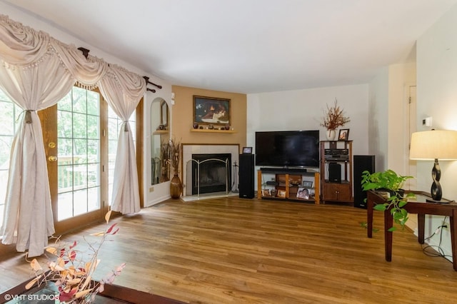 213 Pamela Dr, Bolingbrook, IL 60440 - living area with a tile fireplace and wood finished floors