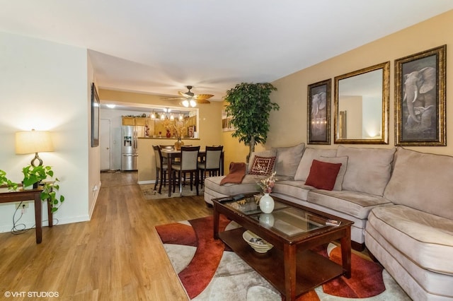 213 Pamela Dr, Bolingbrook, IL 60440 - living area with light wood finished floors and a ceiling fan