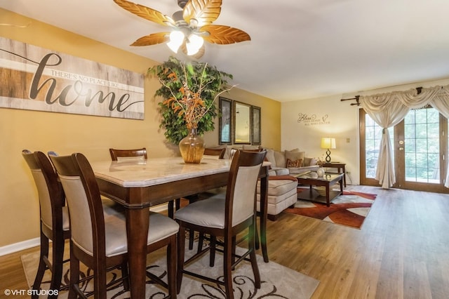 213 Pamela Dr, Bolingbrook, IL 60440 - dining area featuring wood finished floors and a ceiling fan