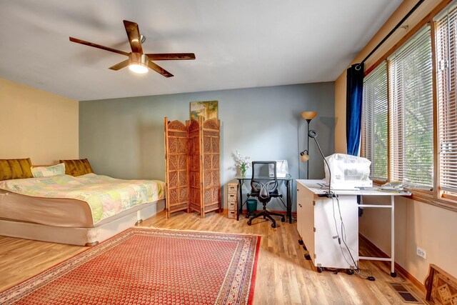 6732 W 113th Pl, Worth, IL 60482 - bedroom featuring wood finished floors and a ceiling fan