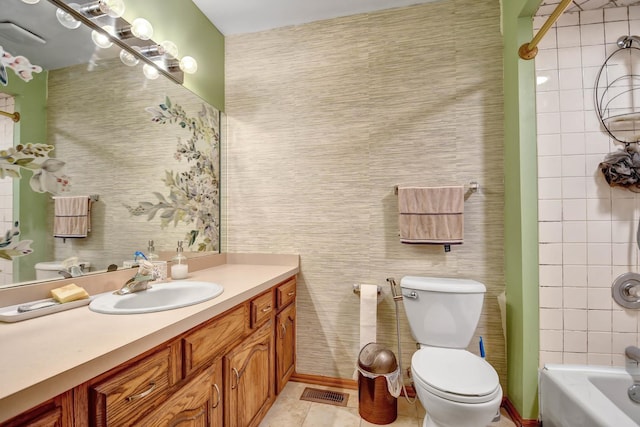 6732 W 113th Pl, Worth, IL 60482 - full bathroom with toilet, vanity, tile patterned floors, wallpapered walls, and washtub / shower combination