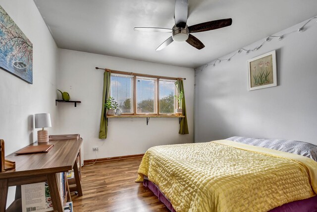 6732 W 113th Pl, Worth, IL 60482 - bedroom featuring wood finished floors, baseboards, and a ceiling fan