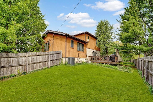 6732 W 113th Pl, Worth, IL 60482 - back of property featuring a wooden deck and central AC unit