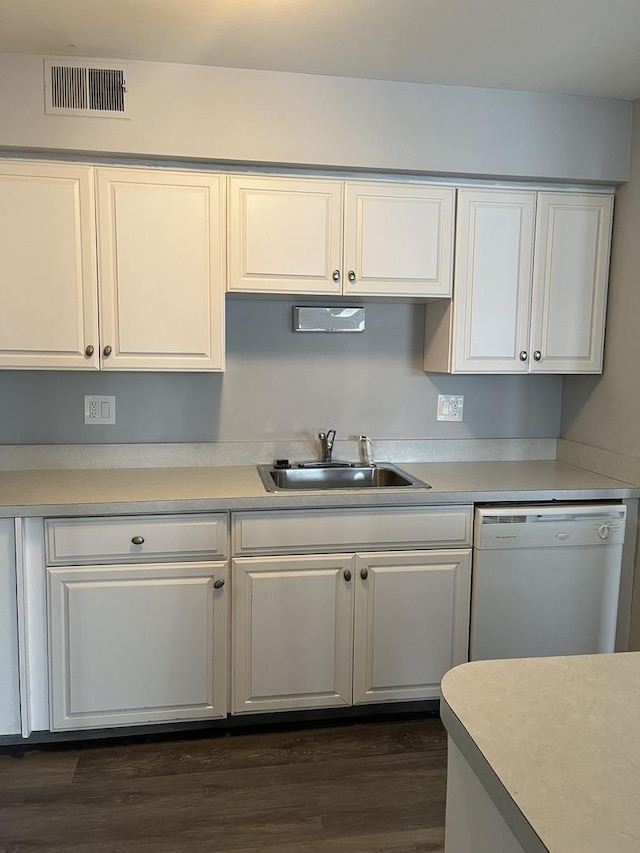 3237 S Manor Dr Unit 310, Lansing, IL 60438 - kitchen with a sink, dishwasher, white cabinets, and light countertops