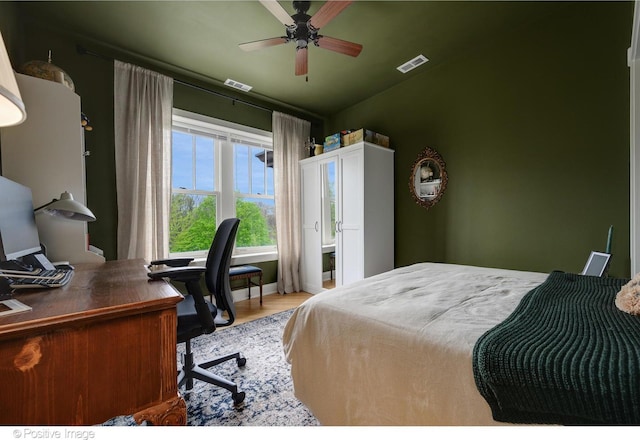 1018 Main St Unit 3, Evanston, IL 60202 - bedroom with wood finished floors, a desk, and baseboards