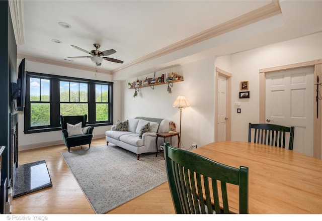 1018 Main St Unit 3, Evanston, IL 60202 - living room featuring ceiling fan, light wood-type flooring, ornamental molding, and baseboards