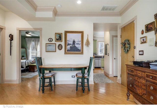 1018 Main St Unit 3, Evanston, IL 60202 - dining space featuring light wood-style floors, a ceiling fan, ornamental molding, and baseboards