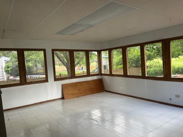 1969 Stanford Dr, Naperville, IL 60565 - unfurnished sunroom featuring a drop ceiling and baseboards