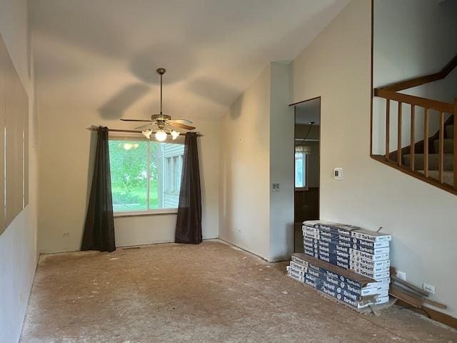 1969 Stanford Dr, Naperville, IL 60565 - spare room with a ceiling fan, lofted ceiling, and stairs