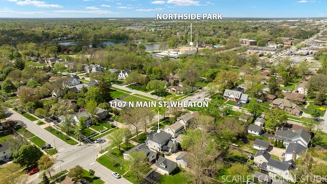 aerial view of residential area with a nearby body of water