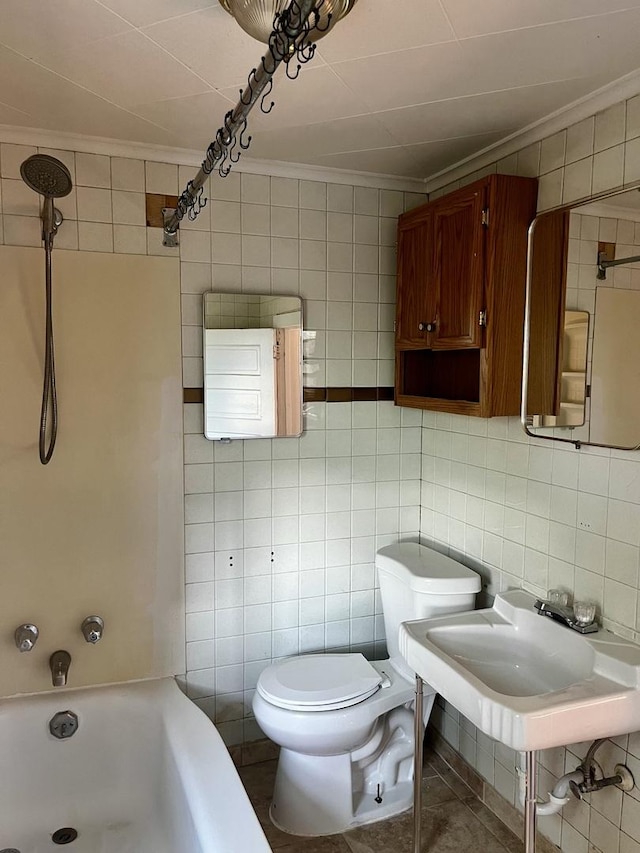 full bath featuring ornamental molding, tile walls, toilet, tasteful backsplash, and tub / shower combination