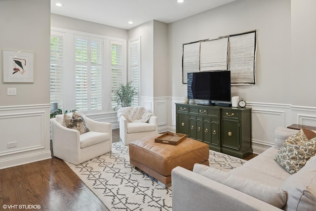 1319 N Oakley Blvd, Chicago, IL 60622 - living room featuring a decorative wall, wainscoting, wood finished floors, and recessed lighting