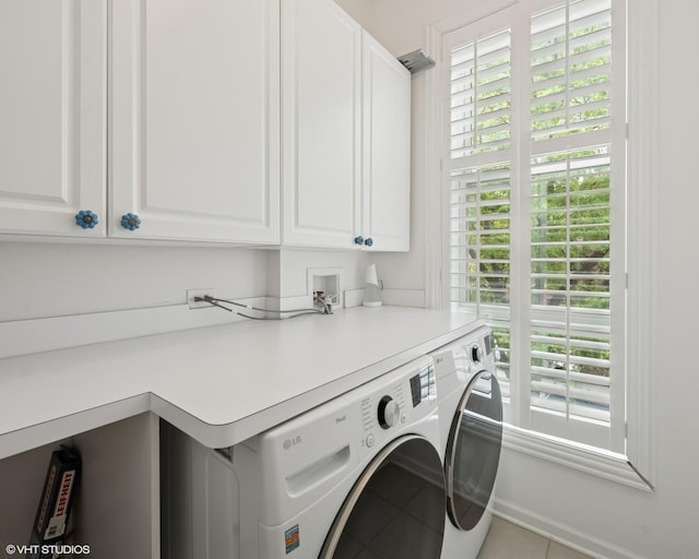 1319 N Oakley Blvd, Chicago, IL 60622 - laundry room with cabinet space, independent washer and dryer, and tile patterned flooring