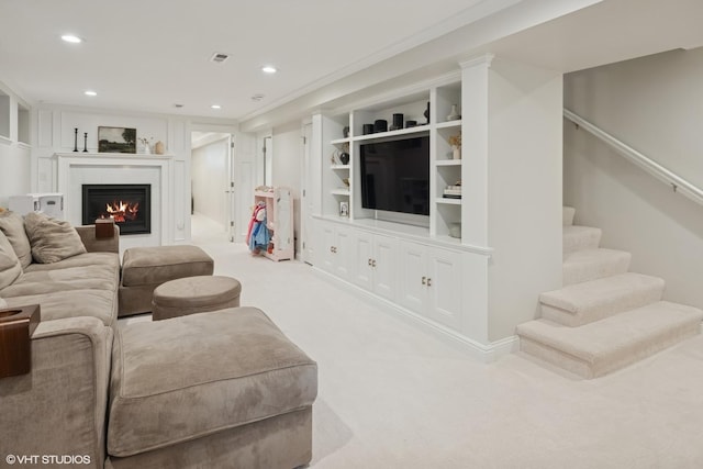 1319 N Oakley Blvd, Chicago, IL 60622 - carpeted living room with recessed lighting, a glass covered fireplace, stairs, and built in features