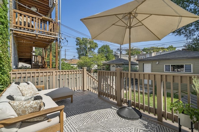 1319 N Oakley Blvd, Chicago, IL 60622 - wooden terrace featuring an outdoor living space, stairs, and an outbuilding