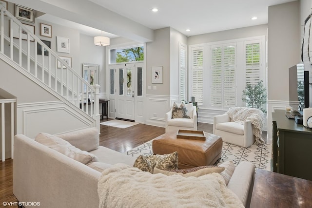 1319 N Oakley Blvd, Chicago, IL 60622 - living area featuring a decorative wall, wood finished floors, stairs, wainscoting, and recessed lighting