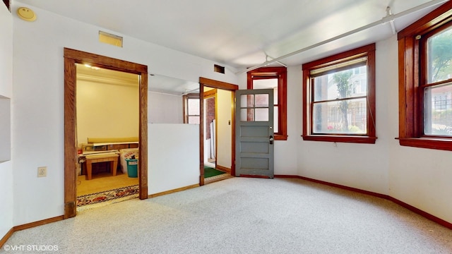 3072 N Haussen Ct, Chicago, IL 60618 - carpeted spare room with baseboards and a smoke detector