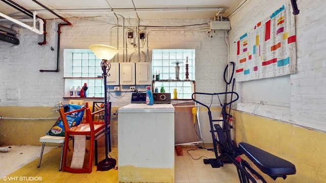 3072 N Haussen Ct, Chicago, IL 60618 - washroom with washer / clothes dryer, healthy amount of natural light, electric panel, and brick wall