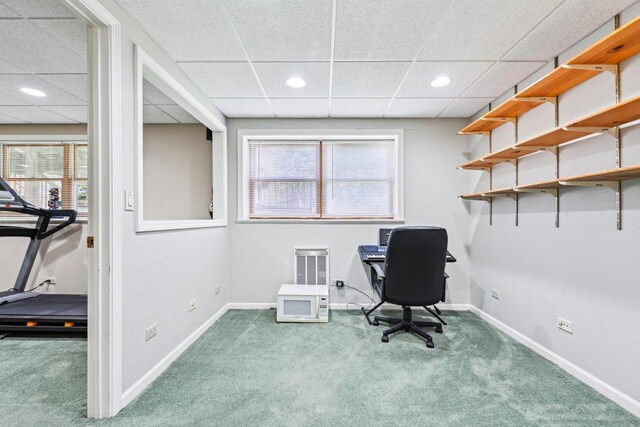 office space with carpet flooring, a drop ceiling, healthy amount of natural light, baseboards, and recessed lighting