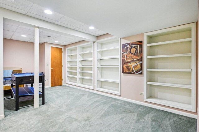 office area with carpet, built in features, baseboards, recessed lighting, and a drop ceiling