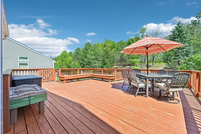 deck featuring outdoor dining space