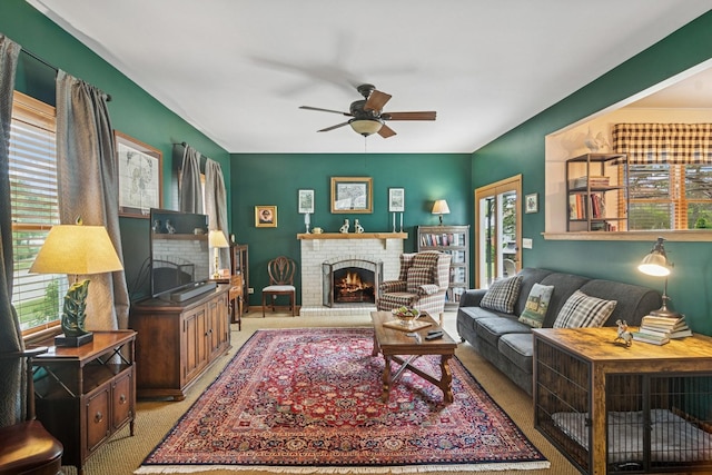 1593 Surridge Ct, Mundelein, IL 60060 - living room featuring a brick fireplace, healthy amount of natural light, ceiling fan, and carpet floors