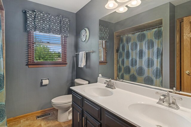 1593 Surridge Ct, Mundelein, IL 60060 - bathroom featuring toilet, double vanity, and a shower with shower curtain