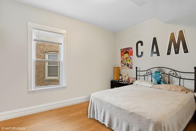 2416 N Avers Ave, Chicago, IL 60647 - bedroom with wood finished floors and baseboards