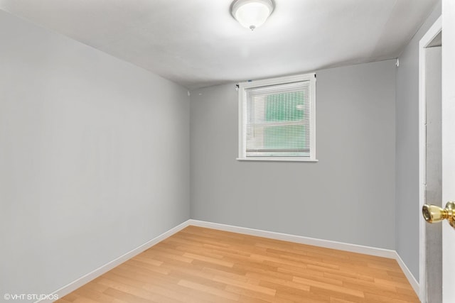 2416 N Avers Ave, Chicago, IL 60647 - unfurnished room with light wood finished floors and baseboards