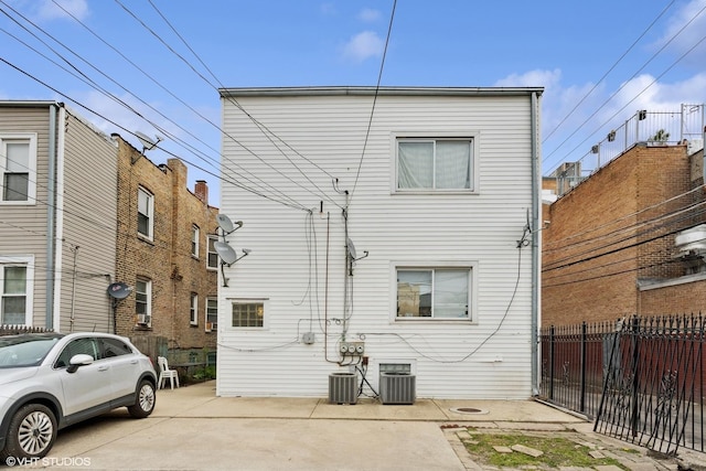 2416 N Avers Ave, Chicago, IL 60647 - back of property featuring fence and central AC unit