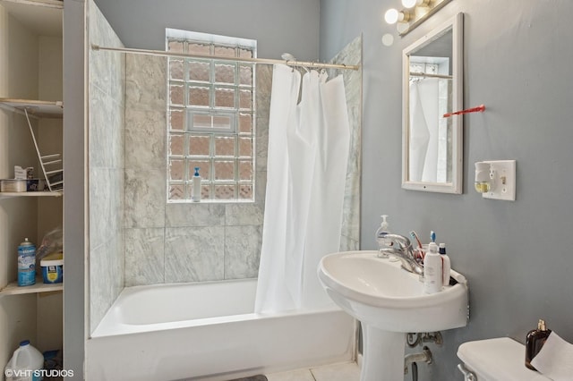 2416 N Avers Ave, Chicago, IL 60647 - bathroom featuring shower / tub combo and tile patterned floors
