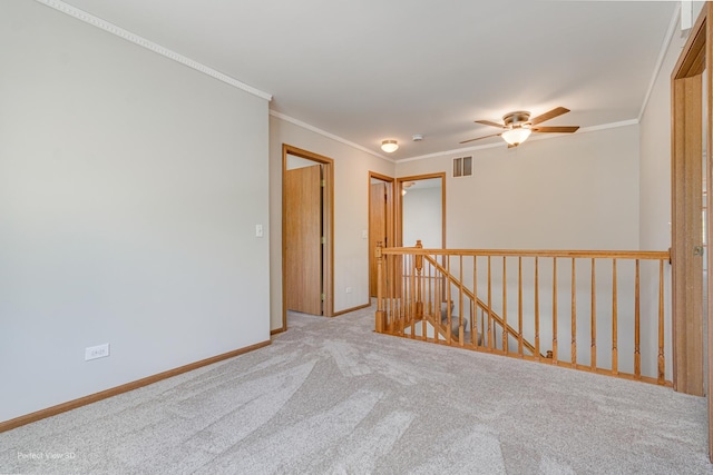 2675 Dorothy Dr, Aurora, IL 60504 - empty room featuring carpet flooring, ceiling fan, baseboards, and ornamental molding